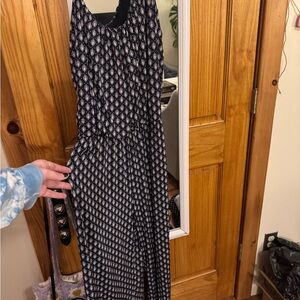 Elegant Navy and White Patterned Romper with Pockets